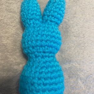 This is a homemade crochet blue peep bunny